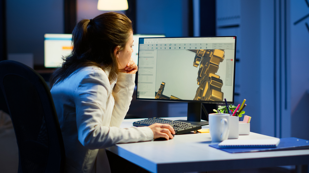 tired-woman-architect-working-modern-cad-program-overtime-sitting-desk-start-up-office-industrial-female-engineer-studying-prototype-idea-pc-showing-cad-software-device-display-1